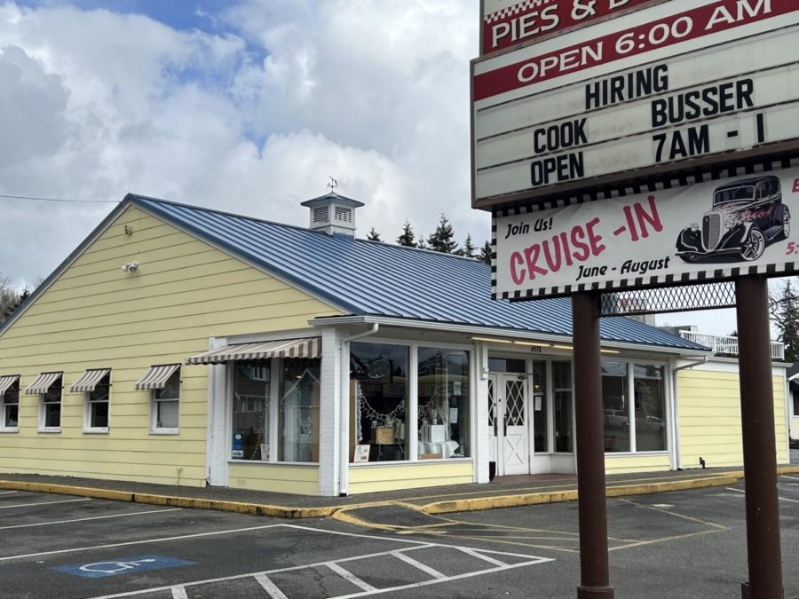 The yellow cafe and the cruise-in sign